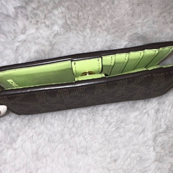 Like New-Michael Kors Monogram Leather Wallet - Picture 3 of 4